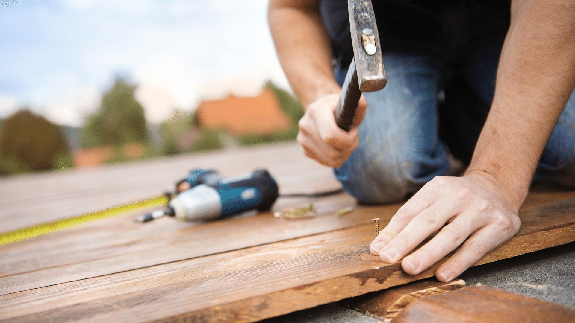 Tampa bay handyman repairing trim and a fence